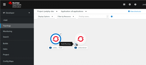 The topology view in the OpenShift console shows that the application image is being built in OpenShift cluster.